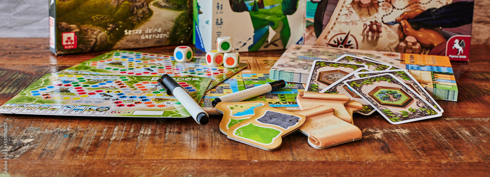 board game, cards, marker and various accessories poster for article