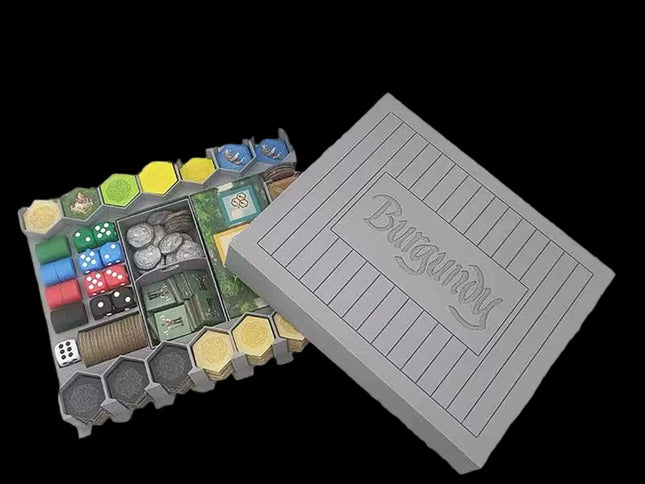 Gray insert for burgundy game components - half opened