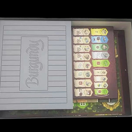 Insert for burgundy game components - inside the game box