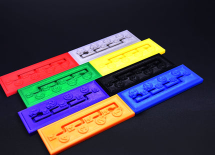 Eight colored Gearboxes for Heat Formula 1 racing board game - side overview