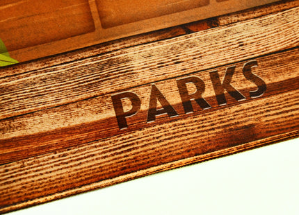 Forest and Mountains style playmat dedicated to Parks, logo focused