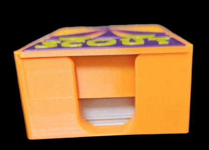 Travel box for Scout the board game in orange color - closed box side 