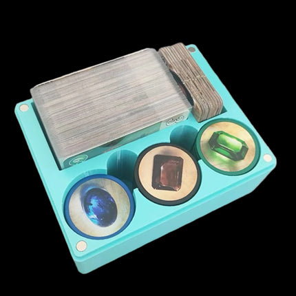 Compact cyan game organizer for splendor with cards and tokens inside