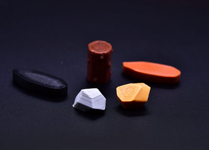 Set of Teotihucan token resources including cocoa, stone and gold -  single pieces