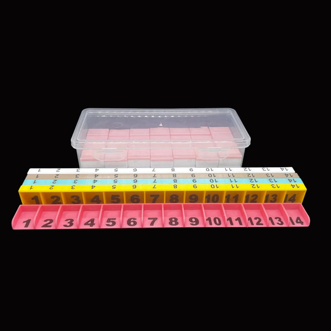 mahjong tiles set in a container with five colorful player game stands in front